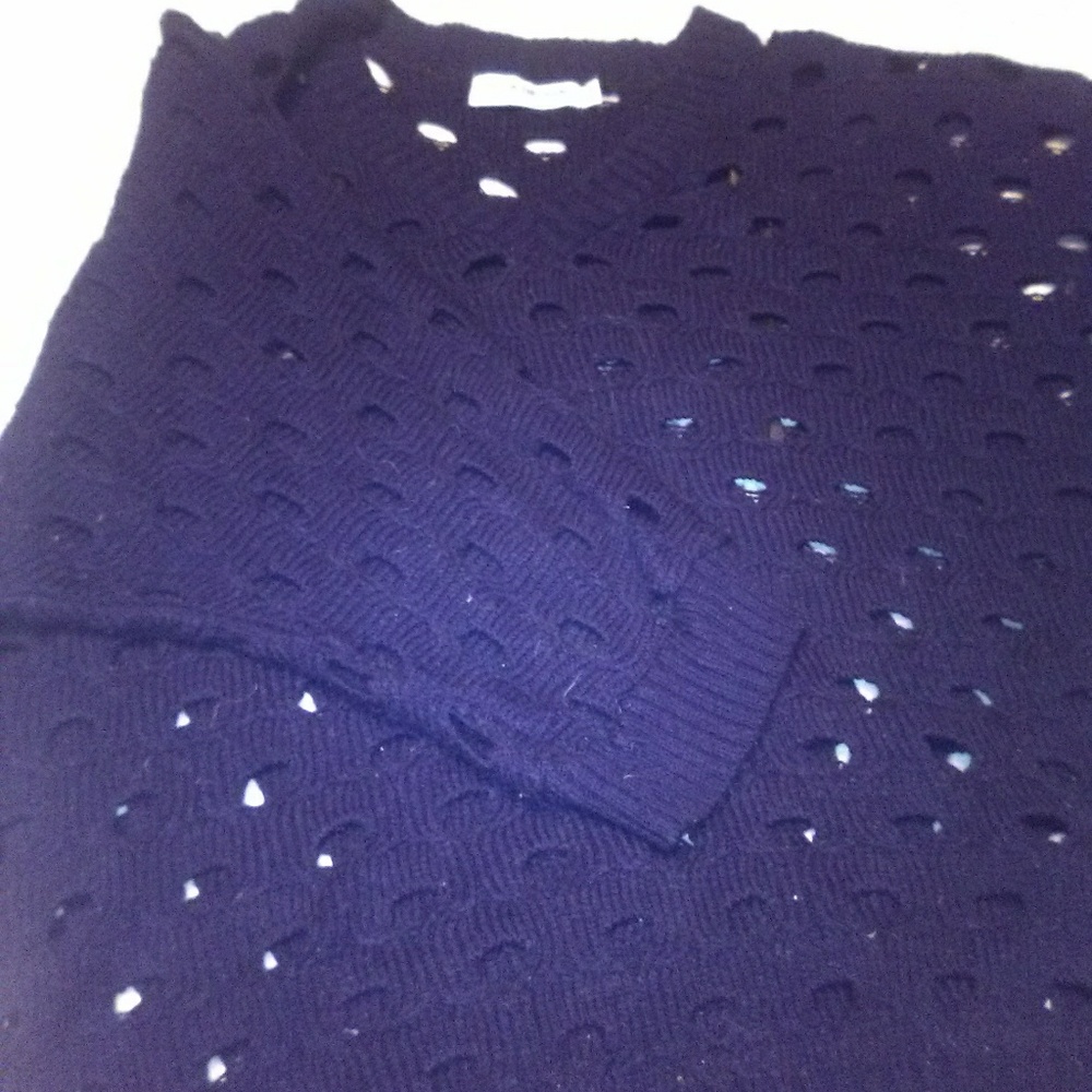 Hole knit sweater